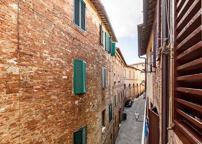 Guesthost - Live The Charm Of Siena Апартаменты Сиена